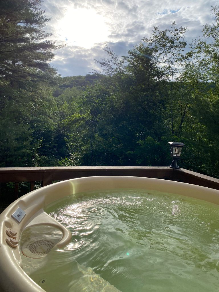 Soothe your muscles, relax and unwind in our Jacuzzi located in the patio, with a breathtaking view of the trees surrounding the cabin.